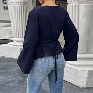 Women's navy blue flared long sleeve blouse with waist tie detail for a slim fit