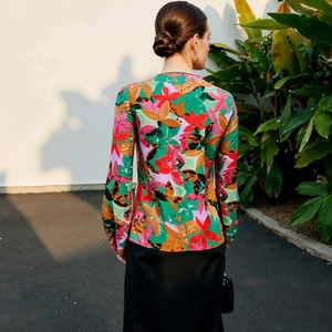 Women's V-neck long sleeve floral print polyester blouse with vibrant pattern back view