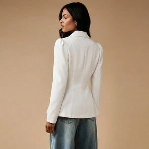 Elegant slim fit white blazer for women with structured shoulders and long sleeves