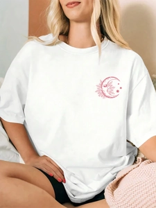 Detail of white cotton oversized tee with pink sun and moon line art on chest
