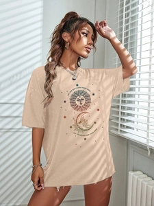 Detail of sun and moon vintage print on beige oversized cotton short sleeve t-shirt