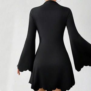 Elegant black slim fit mini dress with long flared sleeves and scalloped hemline