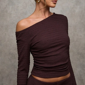 Slim fit two-piece set with dark brown long-sleeved asymmetrical cold shoulder texture top