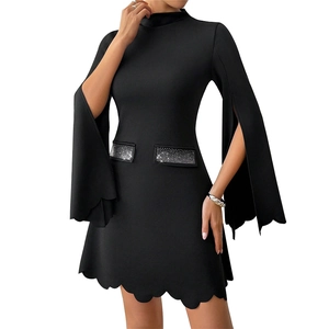 Slim fit black dress featuring dramatic flared sleeves and scalloped hemline details