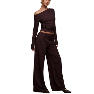 Elegant wine red ribbed two-piece set featuring off-shoulder top and wide leg pants