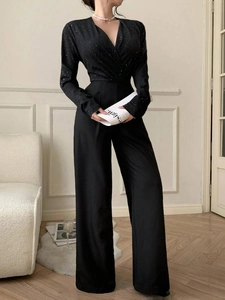 Combinaison élégante noire à paillettes avec col en V et pantalon large pour femme