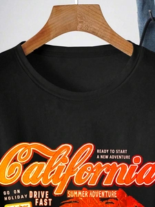 Detail of black crewneck T-shirt with orange California print and reinforced collar