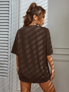 Rear view of oversized dark brown cotton T-shirt with drop shoulder and shadow effect