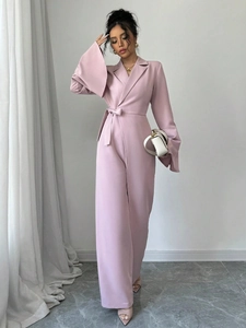 Elegant mauve long sleeve jumpsuit with flare sleeves and belted waist for women