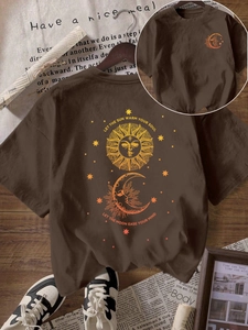 Brown short sleeve t-shirt featuring artistic sun and moon print with inspirational text