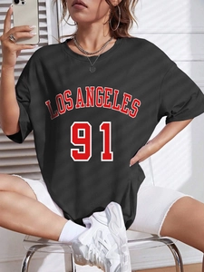 Women's black oversized Los Angeles 91 printed t-shirt with a retro sporty crew neck design