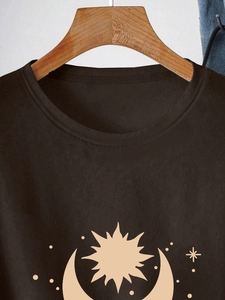 Close-up of crew neck cotton T-shirt in dark coffee featuring sun and moon graphic print