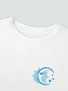 Detail of white cotton T-shirt featuring blue vintage moon and stars print on chest