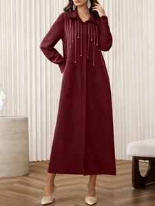 Elegant wine red long-sleeved maxi dress with lapel collar and beaded fringe detail