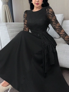 Elegant black lace long sleeve midi dress with A-line silhouette and floral textures