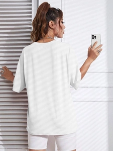 Women's oversized white crew neck t-shirt with drop shoulder design, back view style