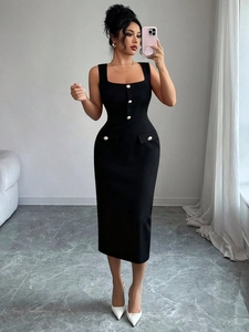 Detail view of black fitted dress with square neckline and decorative pearl buttons