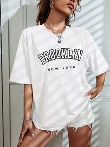 Detail view of Brooklyn New York print on white cotton crewneck short sleeve t-shirt