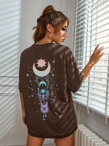 Detail of oversized dark brown T-shirt featuring celestial back print and drop shoulders