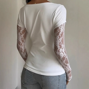 Back view of slim-fit white T-shirt featuring elegant floral lace long sleeves