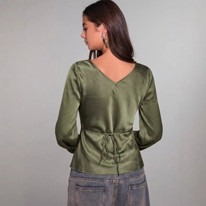Elegant olive green satin long-sleeve blouse featuring a V-neck back and waist tie