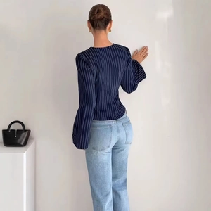 Women's V-neck striped long sleeve shirt with slim waist shown from a back view