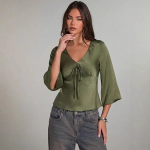 Olive green satin V-neck shirt with bell sleeves and drawstring front for women