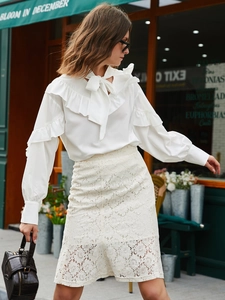 Women's white ruffle tie-neck shirt and floral lace midi skirt professional ensemble
