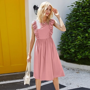 Detailed view of pink sleeveless ruffle dress with elastic waist and A-line silhouette
