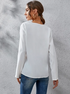 Elegant white long sleeve top with ruffle collar and back view tie detail for women