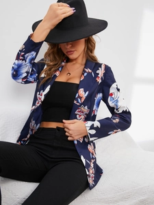 Detailed view of women's slim fit blazer with blue and orange floral print patterns