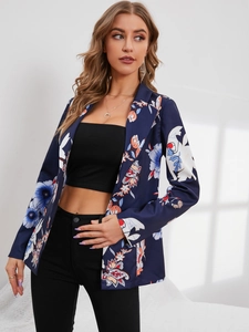 Detailed side view of dark blue floral blazer with vibrant orange and white blossom patterns