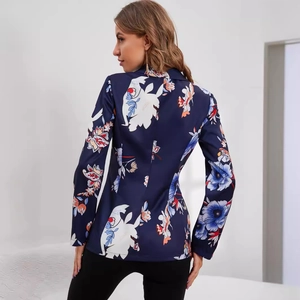 Deep blue floral print blazer for women featuring vibrant white and orange flower patterns