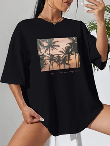 Women's black oversized T-shirt with palm tree sunset print and casual crew neck