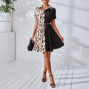 Short sleeve two-tone shirt dress with abstract print, tie waist and A-line silhouette