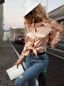 Champagne satin long sleeve blouse with geometric patterns and front knot styling