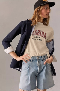 Women's vintage Florida 1989 print t-shirt with navy blazer and denim shorts