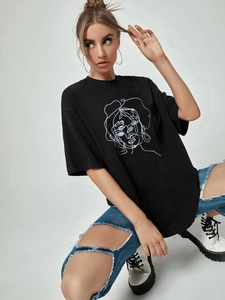 Women's black oversized cotton T-shirt with abstract line art portrait print