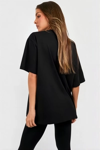 Damen Oversize T-Shirt in Schwarz mit Rundhalsausschnitt und lässigem Drop-Shoulder-Design