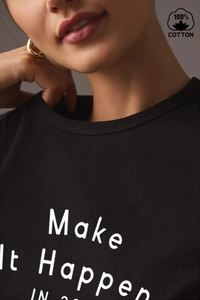 Detailed close-up of 100% cotton black t-shirt with white 'Make It Happen' letter print