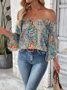 Women's vintage bohemian off-shoulder top featuring blue paisley print and flared sleeves