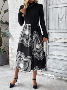 Women's elegant long sleeve dress featuring a black mock neck top and wavy striped A-line skirt