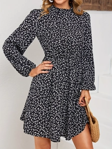 Floral print long sleeve dress with high neck and white flowers on black fabric