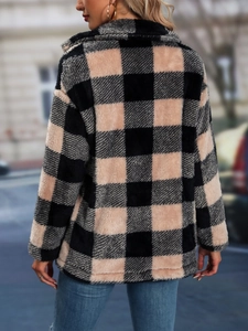 Rear view of a soft flannel plaid jacket for women featuring a cozy fleece texture
