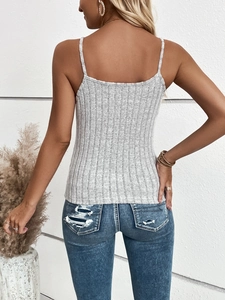 Detailed view of the grey ribbed knit camisole texture and slim fit back design