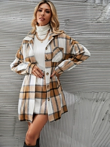Detailed texture of women's plaid jacket and matching skirt in brown and beige tones