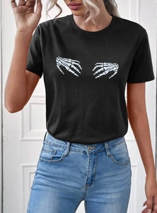 Women's black crewneck T-shirt with white skeleton hands print and casual blue jeans