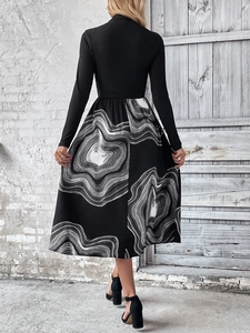 Detailed back view of a high-waisted A-line dress with abstract marble texture prints