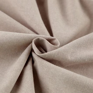 Close-up detail of the natural linen cotton fabric texture for a vintage dress