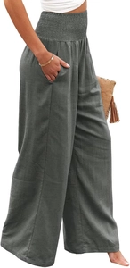 Detail of high waisted smocked elastic waistband on grey wide leg linen pants